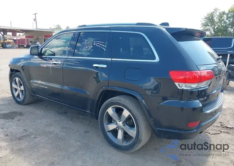 2014 Jeep Grand Cherokee Overland из США, поврежденный, VIN 1C4RJECG4EC410218